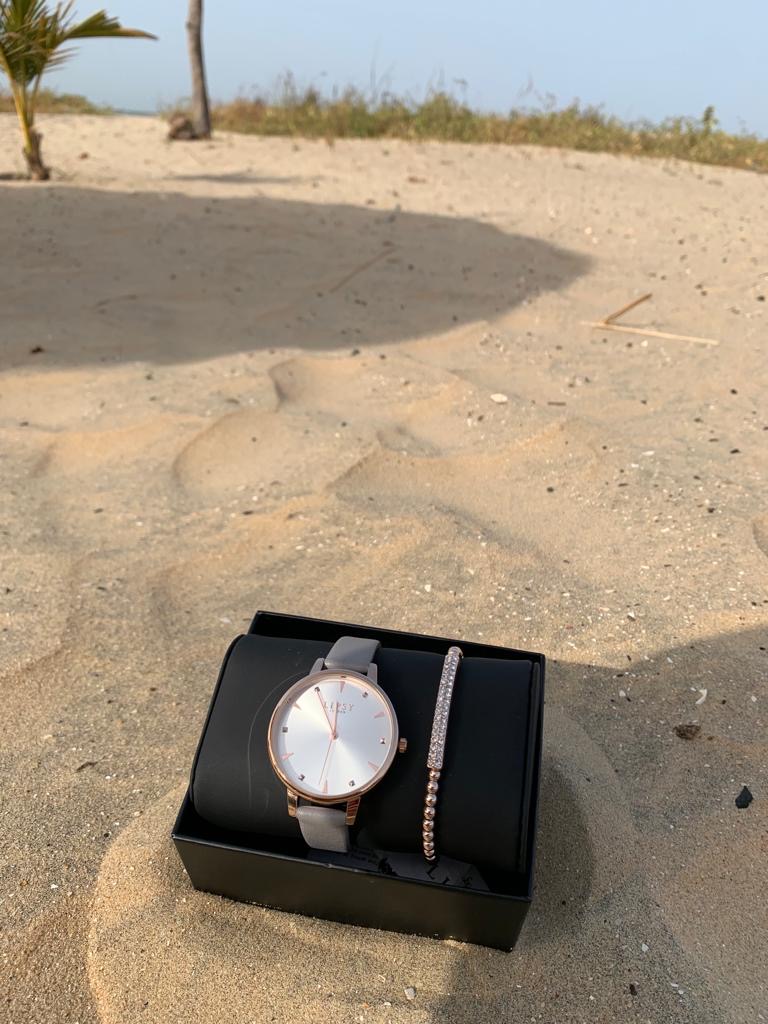 Lipsy watch and bracelet set photographed on a Gambian beach